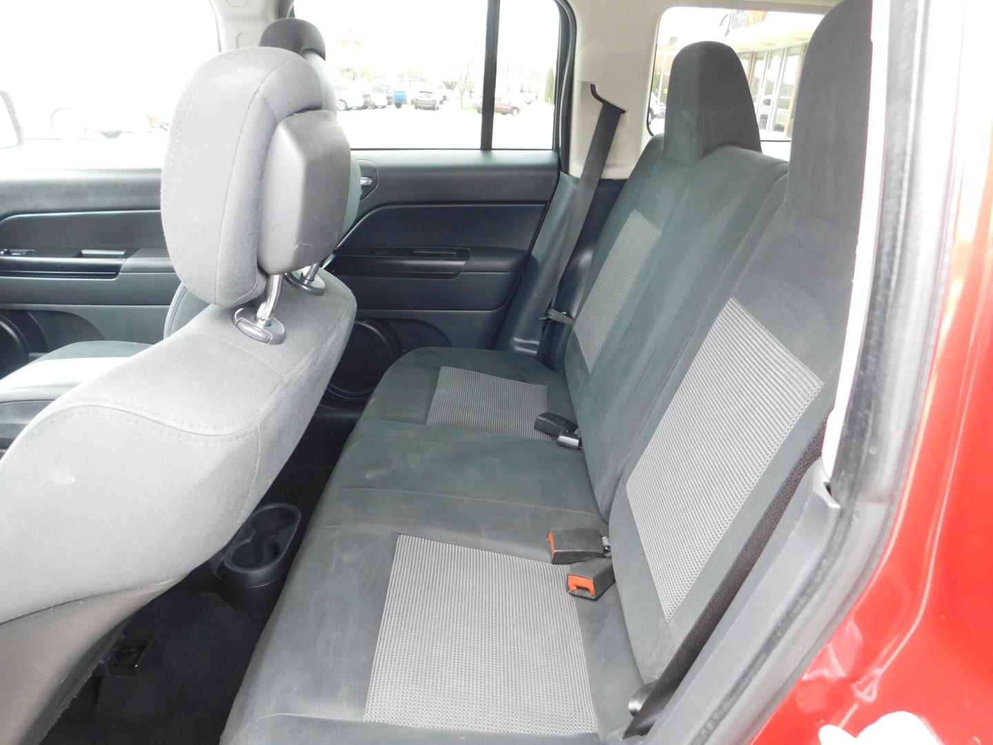 2012 MAROON Jeep Patriot Latitude 2WD (1C4NJPFA6CD) with an 2.0L L4 DOHC 16V engine, located at 2121 Burlington St, North Kansas City, MO, 64116, (816) 556-0707, 39.144707, -94.581978 - Photo#5