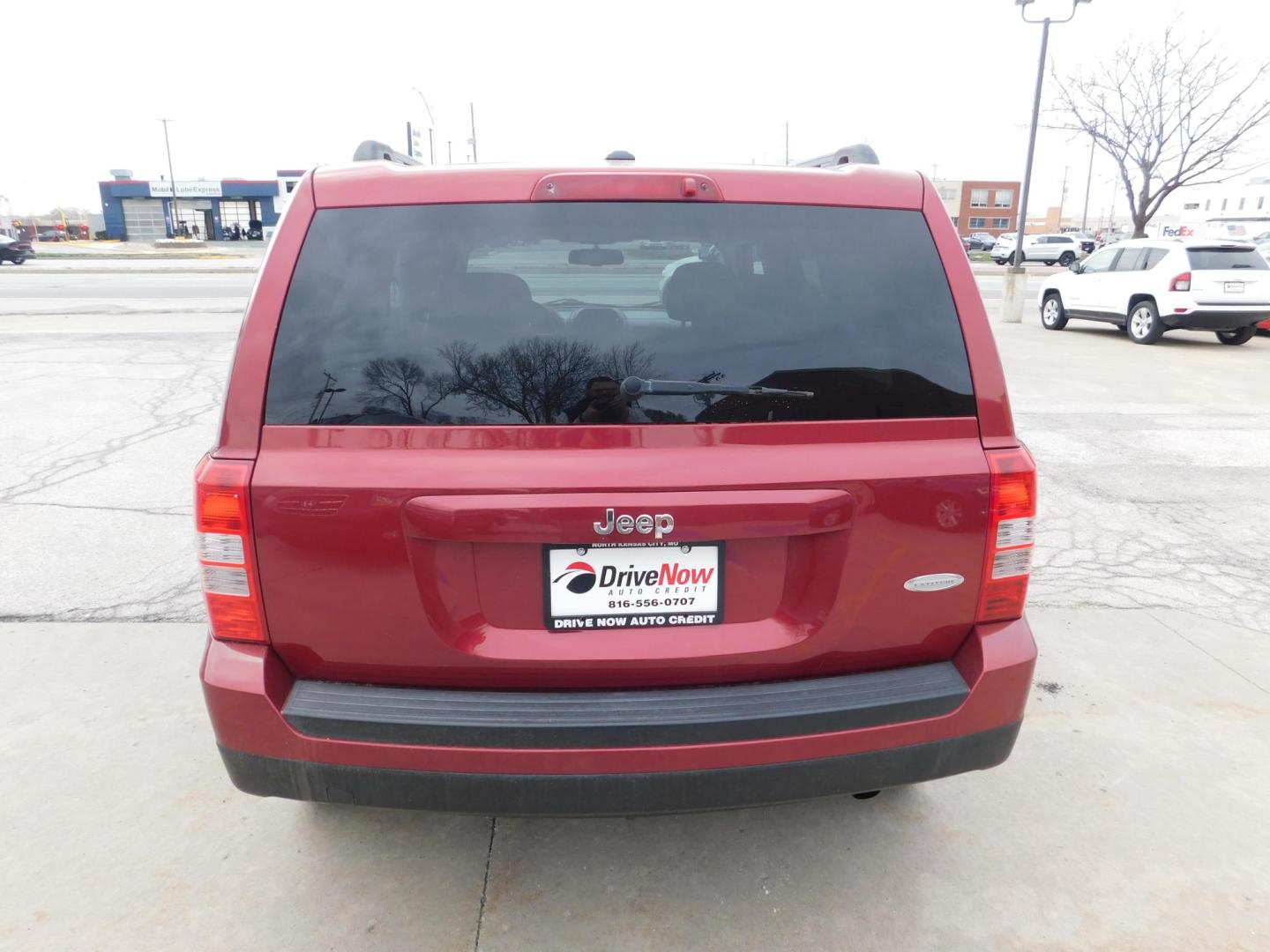 2012 MAROON Jeep Patriot Latitude 2WD (1C4NJPFA6CD) with an 2.0L L4 DOHC 16V engine, located at 2121 Burlington St, North Kansas City, MO, 64116, (816) 556-0707, 39.144707, -94.581978 - Photo#7