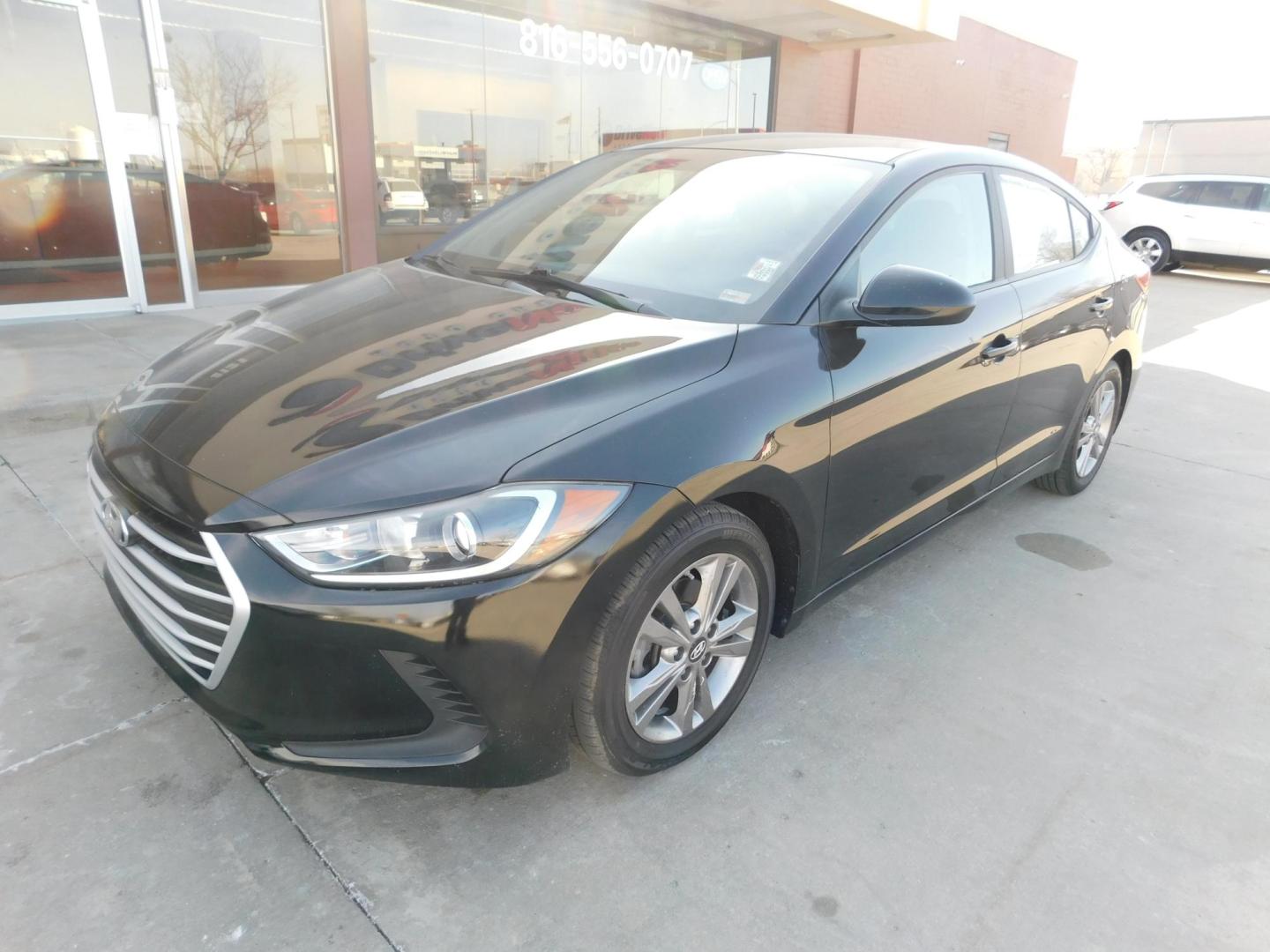 2017 BLACK Hyundai Elantra Limited (KMHD84LF1HU) with an 1.8L L4 DOHC 16V engine, 6A transmission, located at 2121 Burlington St, North Kansas City, MO, 64116, (816) 556-0707, 39.144707, -94.581978 - Photo#0