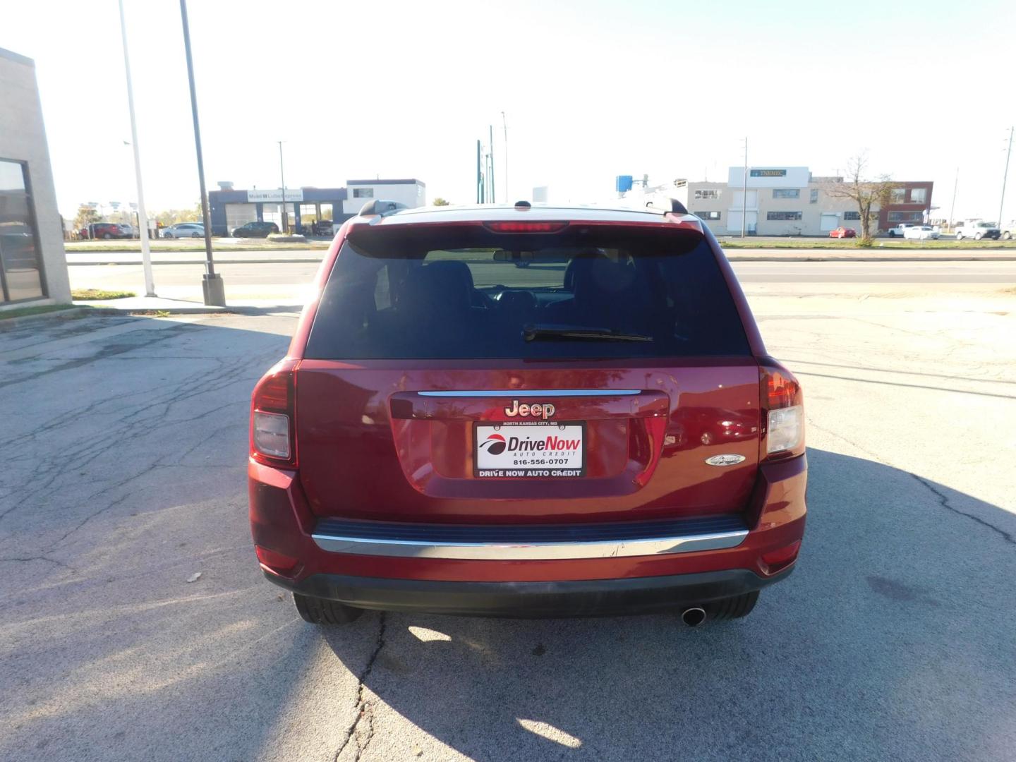 2016 RED Jeep Compass Latitude FWD (1C4NJCEA2GD) with an 2.0L L4 DOHC 16V engine, CVT transmission, located at 2121 Burlington St, North Kansas City, MO, 64116, (816) 556-0707, 39.144707, -94.581978 - Photo#8