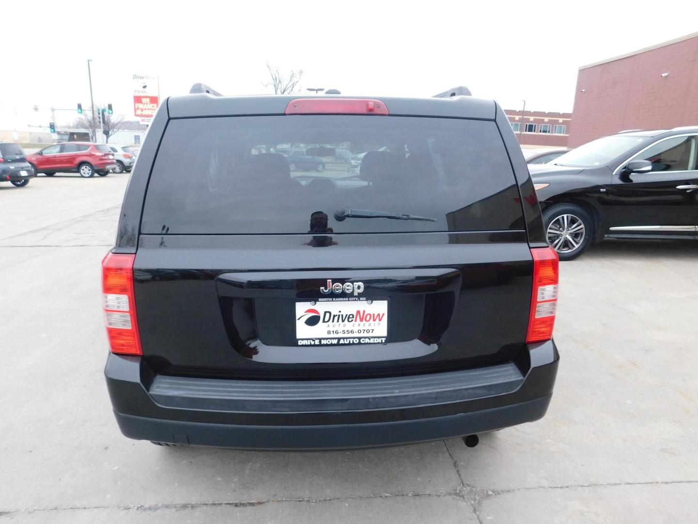 2016 BLACK Jeep Patriot Sport 2WD (1C4NJPBA6GD) with an 2.0L L4 DOHC 16V engine, located at 2121 Burlington St, North Kansas City, MO, 64116, (816) 556-0707, 39.144707, -94.581978 - Photo#7