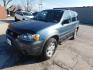 2005 BLUE Ford Escape XLT 2WD (1FMYU03115K) with an 3.0L V6 DOHC 24V engine, 4-Speed Automatic Overdrive transmission, located at 2121 Burlington St, North Kansas City, MO, 64116, (816) 556-0707, 39.144707, -94.581978 - Photo#0