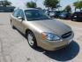 2001 GOLD Ford Taurus SEL (1FAFP56S01G) with an 3.0L V6 DOHC 24V engine, 4-Speed Automatic Overdrive transmission, located at 2121 Burlington St, North Kansas City, MO, 64116, (816) 556-0707, 39.144707, -94.581978 - Photo#7