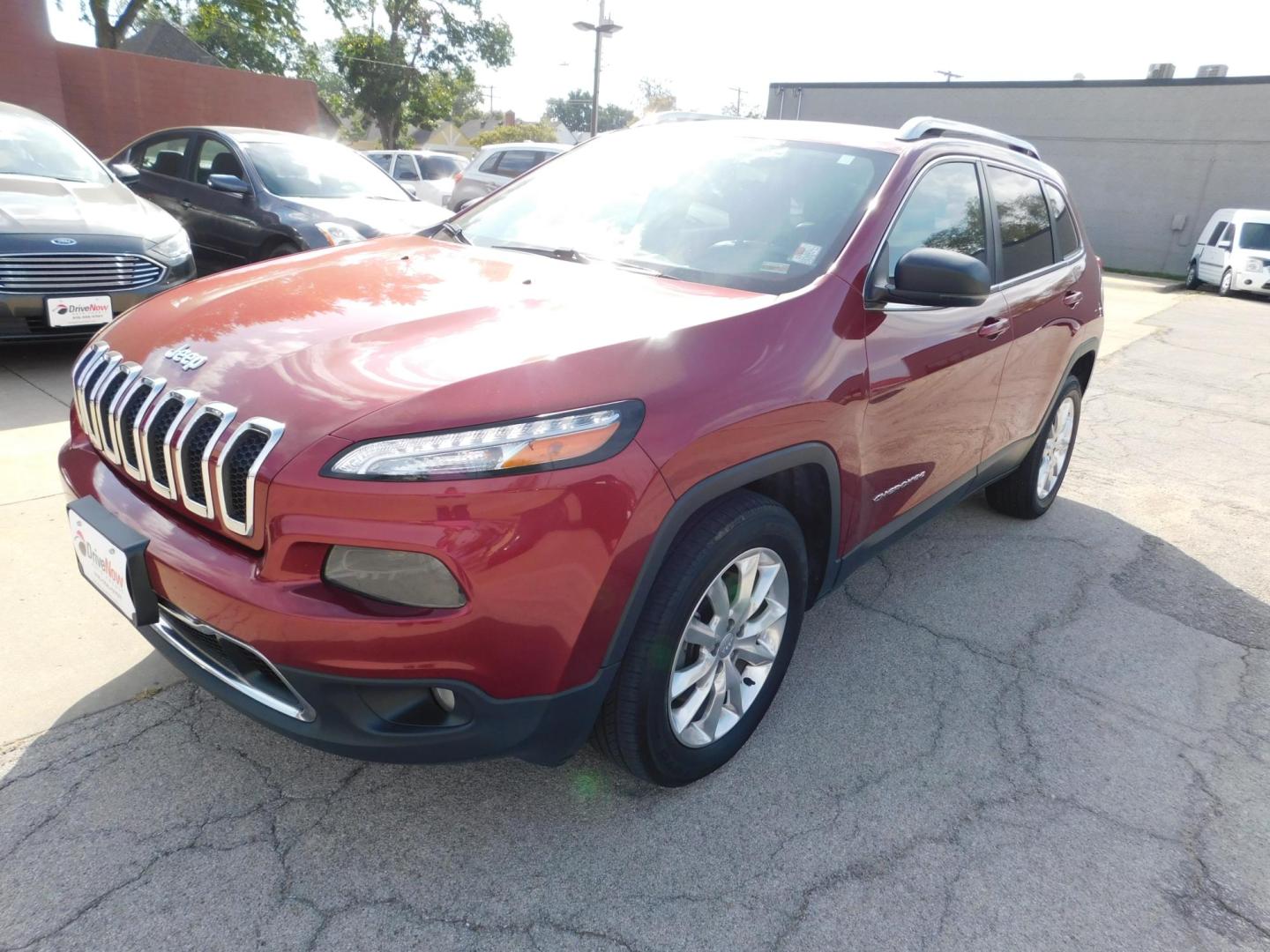 2016 RED Jeep Cherokee Limited 4WD (1C4PJMDB3GW) with an 2.4L L4 DOHC 16V engine, 9A transmission, located at 2121 Burlington St, North Kansas City, MO, 64116, (816) 556-0707, 39.144707, -94.581978 - Photo#0