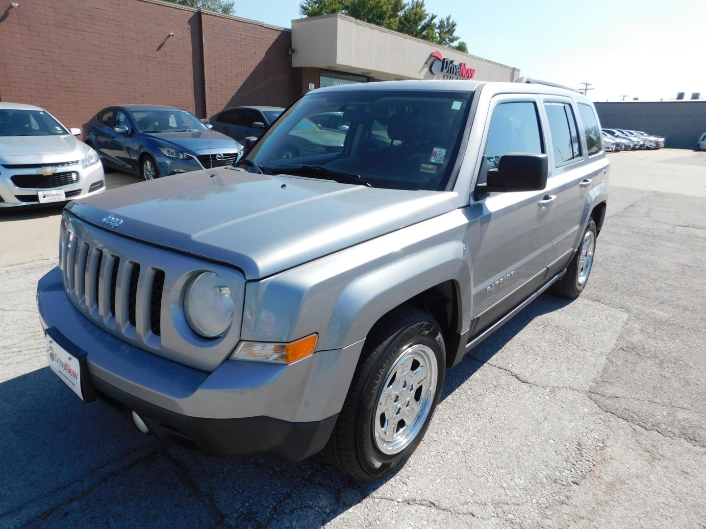 2014 SILVER Jeep Patriot Sport 2WD (1C4NJPBB5ED) with an 2.4L L4 DOHC 16V engine, located at 2121 Burlington St, North Kansas City, MO, 64116, (816) 556-0707, 39.144707, -94.581978 - Photo#0