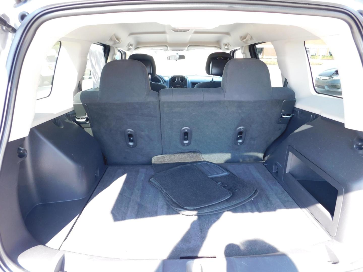2014 SILVER Jeep Patriot Sport 2WD (1C4NJPBB5ED) with an 2.4L L4 DOHC 16V engine, located at 2121 Burlington St, North Kansas City, MO, 64116, (816) 556-0707, 39.144707, -94.581978 - Photo#6