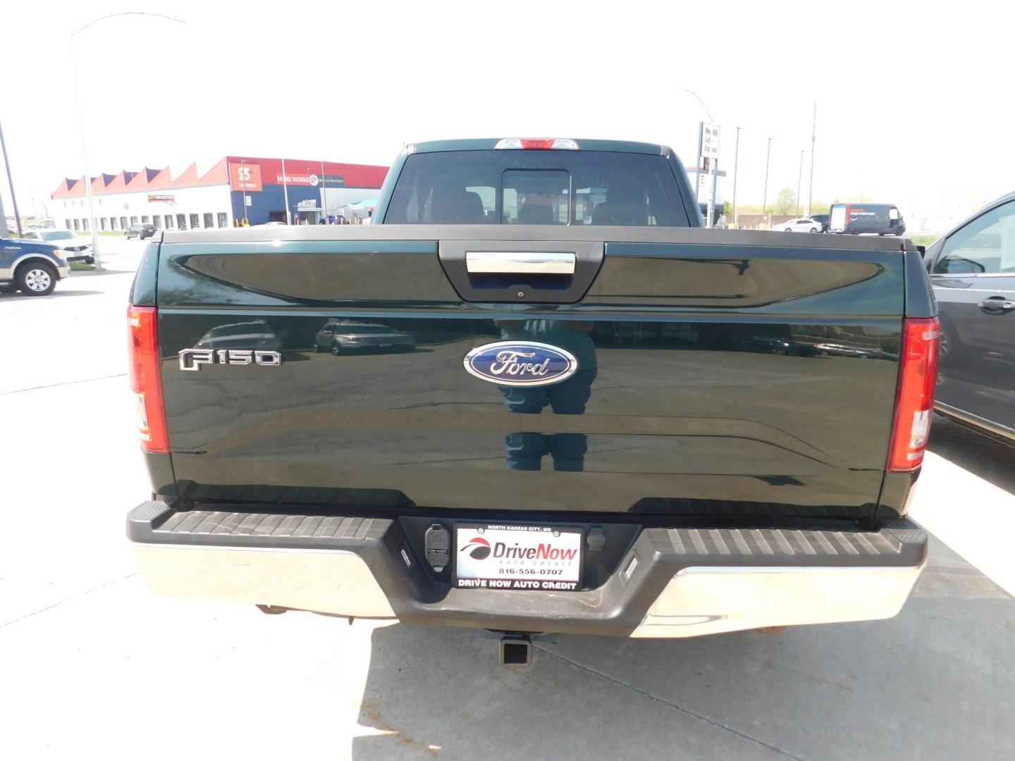 2015 GREEN Ford F-150 Lariat SuperCab 6.5-ft. Bed 4WD (1FTEX1EP6FF) with an 2.7L V6 DOHC 24V engine, 6-Speed Automatic transmission, located at 2121 Burlington St, North Kansas City, MO, 64116, (816) 556-0707, 39.144707, -94.581978 - Photo#7