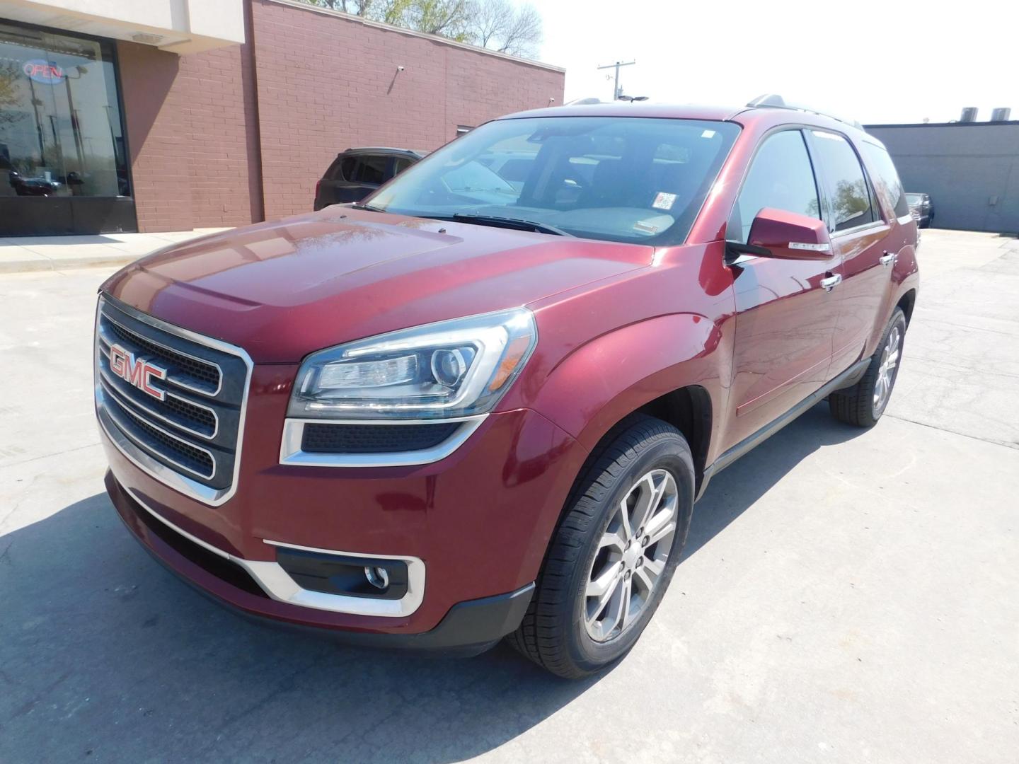 2015 RED GMC Acadia SLT-1 FWD (1GKKRRKD3FJ) with an 3.6L V6 DOHC 24V engine, 6-Speed Automatic transmission, located at 2121 Burlington St, North Kansas City, MO, 64116, (816) 556-0707, 39.144707, -94.581978 - Photo#0