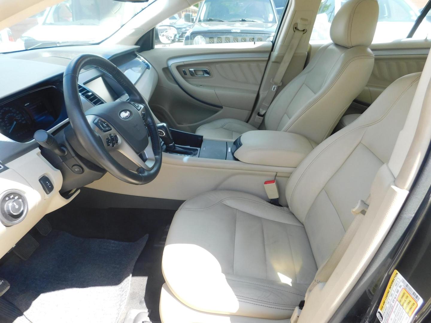 2015 GRAY Ford Taurus SEL FWD (1FAHP2E8XFG) with an 3.5L V6 DOHC 24V engine, 6-Speed Automatic transmission, located at 2121 Burlington St, North Kansas City, MO, 64116, (816) 556-0707, 39.144707, -94.581978 - Photo#2