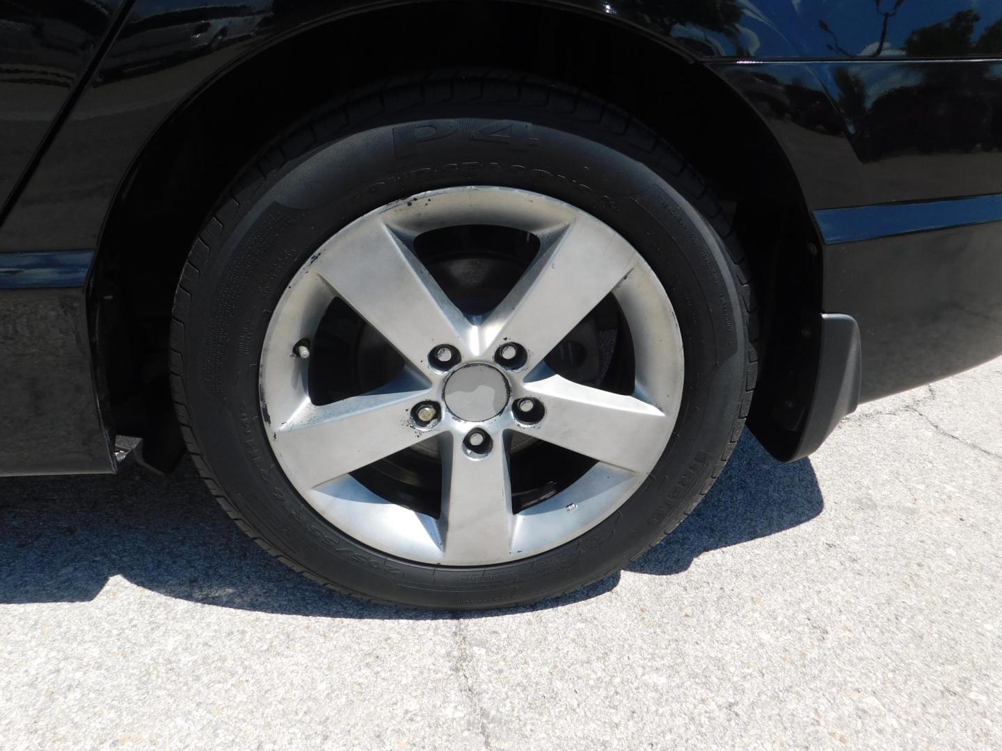 2009 BLACK Honda Civic EX-L Sedan 5-Speed AT (1HGFA16999L) with an 1.8L L4 SOHC 16V engine, 5-Speed Automatic transmission, located at 2121 Burlington St, North Kansas City, MO, 64116, (816) 556-0707, 39.144707, -94.581978 - Photo#1