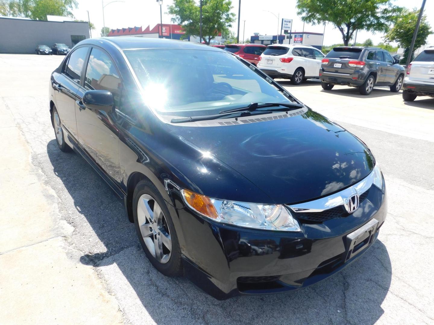 2009 BLACK Honda Civic EX-L Sedan 5-Speed AT (1HGFA16999L) with an 1.8L L4 SOHC 16V engine, 5-Speed Automatic transmission, located at 2121 Burlington St, North Kansas City, MO, 64116, (816) 556-0707, 39.144707, -94.581978 - Photo#9