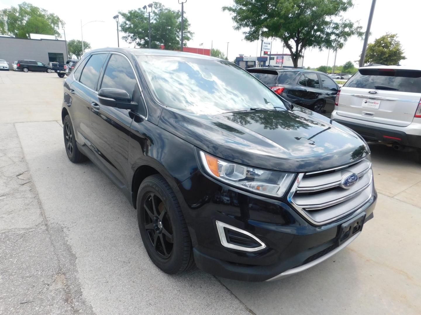 2017 BLACK Ford Edge SEL FWD (2FMPK3J94HB) with an 2.0L L4 DOHC 16V engine, 6A transmission, located at 2121 Burlington St, North Kansas City, MO, 64116, (816) 556-0707, 39.144707, -94.581978 - Photo#9