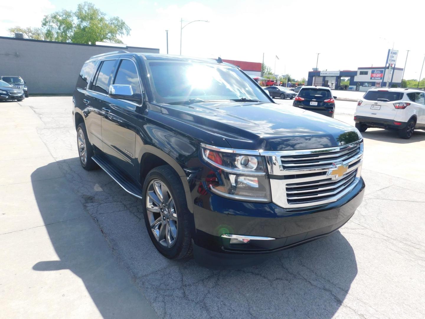 2015 BLACK Chevrolet Tahoe LTZ 4WD (1GNSKCKC3FR) with an 5.3L V8 OHV 16V engine, 6-Speed Automatic transmission, located at 2121 Burlington St, North Kansas City, MO, 64116, (816) 556-0707, 39.144707, -94.581978 - Photo#11