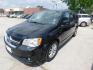 2018 BLACK Dodge Grand Caravan SXT (2C4RDGCG2JR) with an 3.6L V6 DOHC 24V engine, 6A transmission, located at 2121 Burlington St, North Kansas City, MO, 64116, (816) 556-0707, 39.144707, -94.581978 - Photo#0