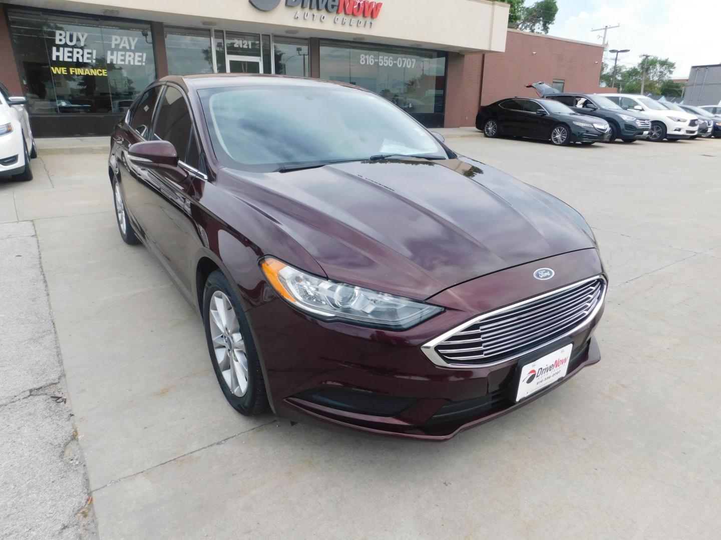 2017 RED Ford Fusion SE (3FA6P0H74HR) with an 2.5L L4 DOHC 16V engine, 6A transmission, located at 2121 Burlington St, North Kansas City, MO, 64116, (816) 556-0707, 39.144707, -94.581978 - Photo#9
