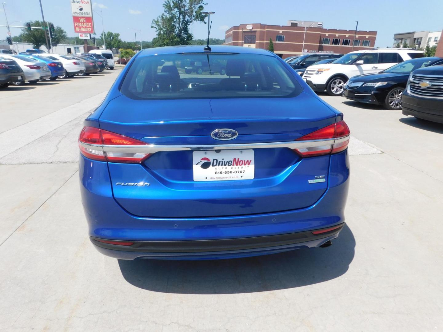 2017 BLUE Ford Fusion SE (3FA6P0HDXHR) with an 1.5L L4 DOHC 16V engine, 6A transmission, located at 2121 Burlington St, North Kansas City, MO, 64116, (816) 556-0707, 39.144707, -94.581978 - Photo#8
