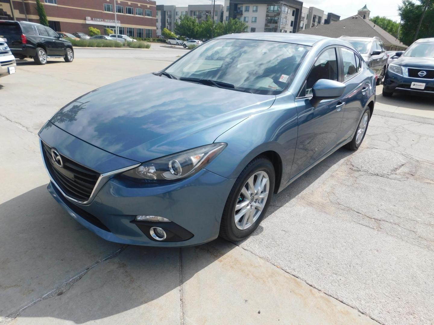 2014 BLUE Mazda MAZDA3 i Touring AT 4-Door (JM1BM1V77E1) with an 2.0L L4 DOHC 16V engine, 6-Speed Automatic transmission, located at 2121 Burlington St, North Kansas City, MO, 64116, (816) 556-0707, 39.144707, -94.581978 - Photo#0