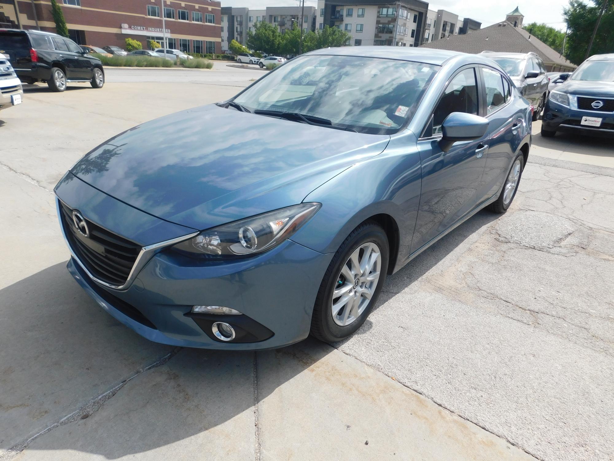 photo of 2014 Mazda MAZDA3 i Touring AT 4-Door