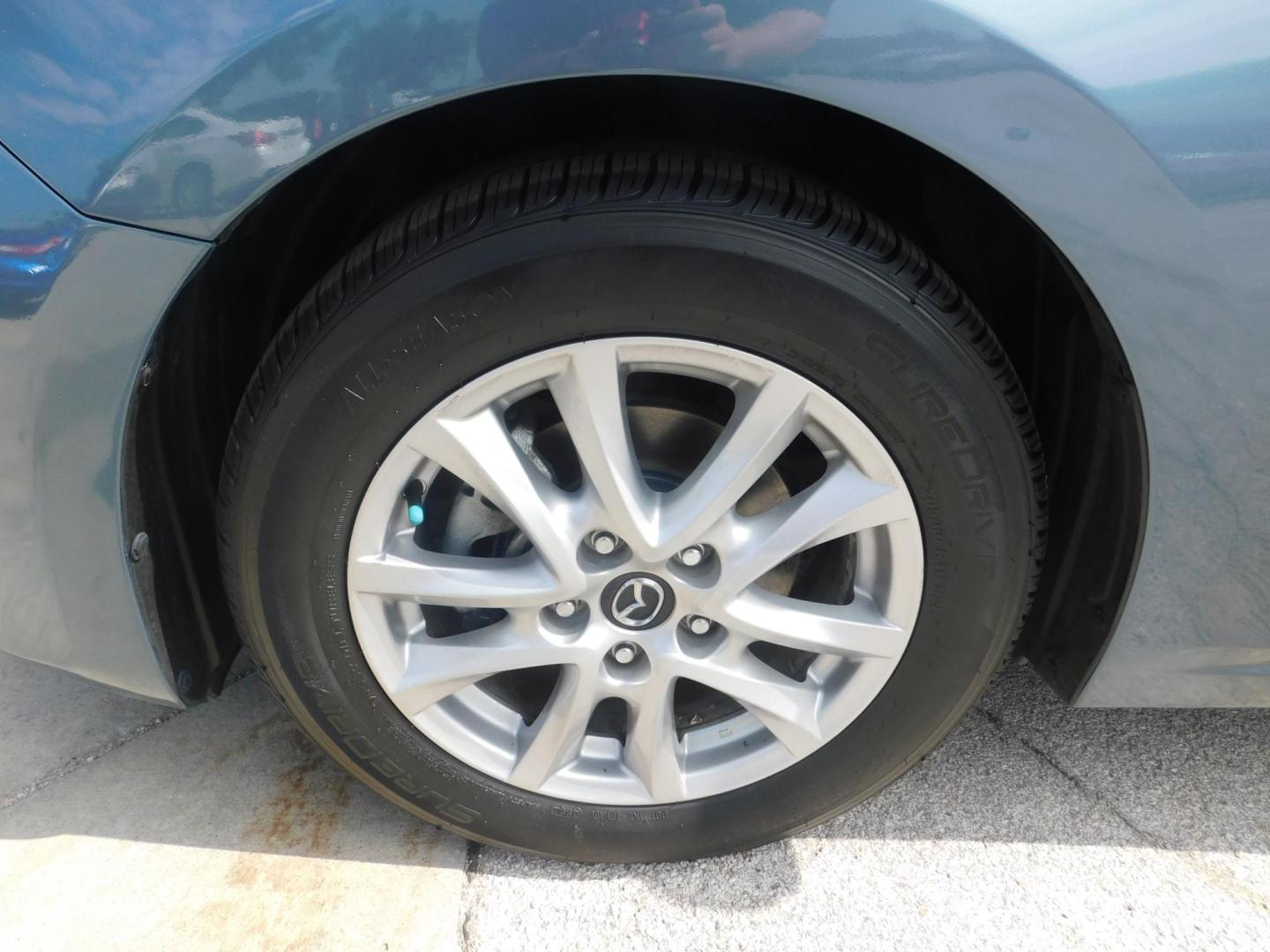 2014 BLUE Mazda MAZDA3 i Touring AT 4-Door (JM1BM1V77E1) with an 2.0L L4 DOHC 16V engine, 6-Speed Automatic transmission, located at 2121 Burlington St, North Kansas City, MO, 64116, (816) 556-0707, 39.144707, -94.581978 - Photo#1