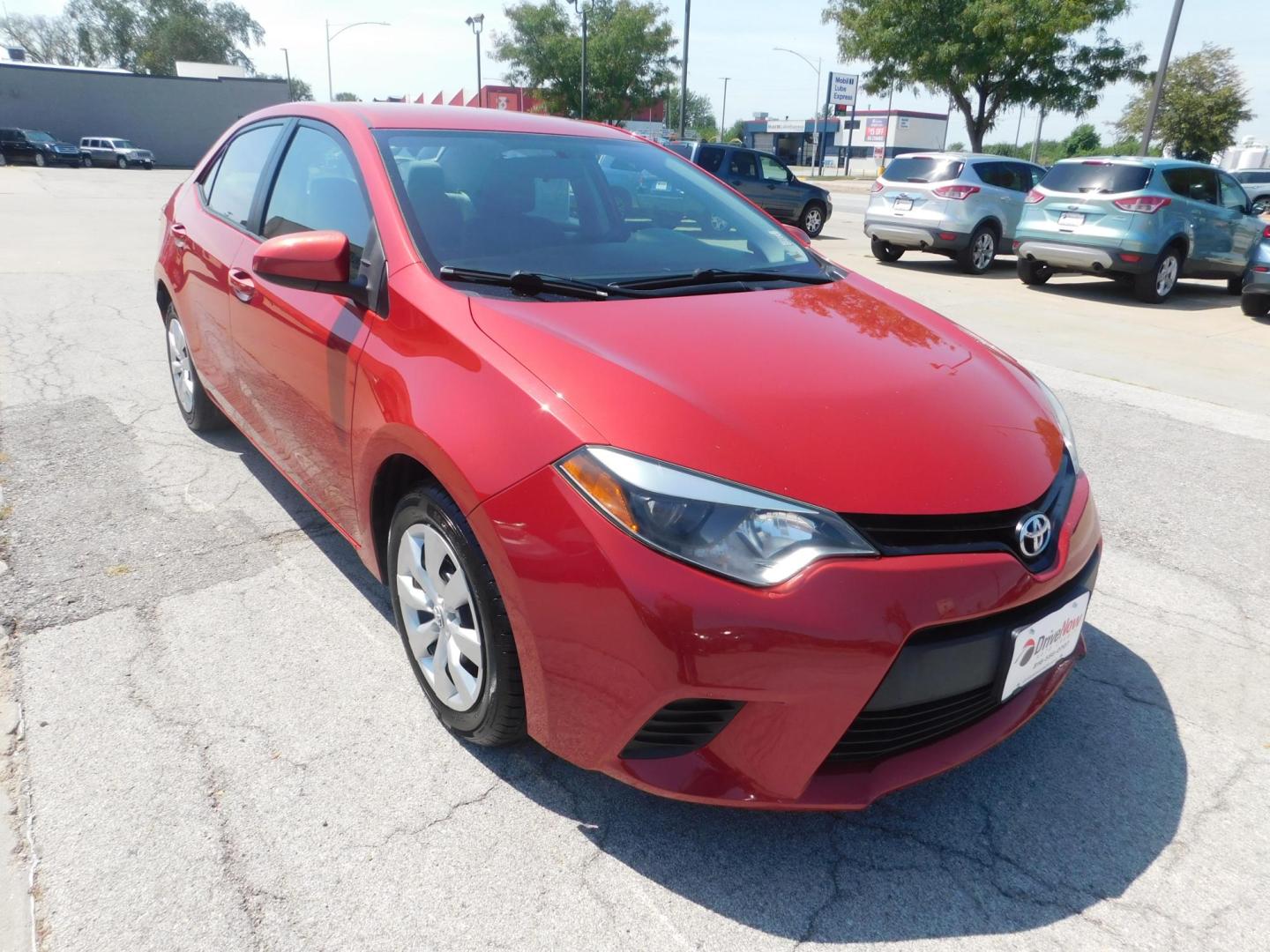 2014 RED Toyota Corolla L 4-Speed AT (2T1BURHE6EC) with an 1.8L L4 DOHC 16V engine, 4-Speed Automatic transmission, located at 2121 Burlington St, North Kansas City, MO, 64116, (816) 556-0707, 39.144707, -94.581978 - Photo#9