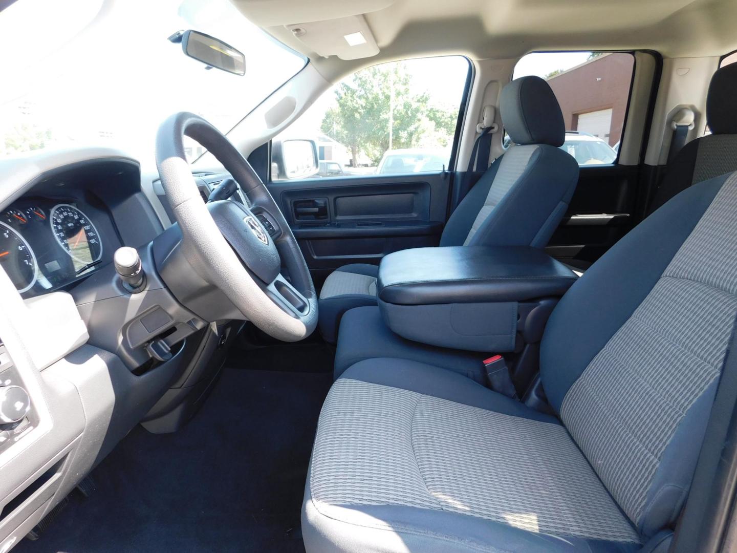 2012 SILVER Dodge Ram 1500 ST Quad Cab 4WD (1C6RD7FTXCS) with an 5.7L V8 OHV 16V engine, 6-Speed Automatic transmission, located at 2121 Burlington St, North Kansas City, MO, 64116, (816) 556-0707, 39.144707, -94.581978 - Photo#2