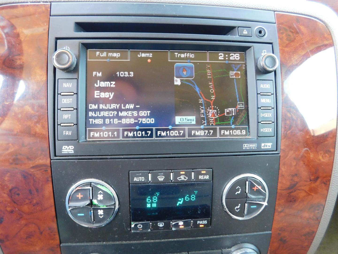 2009 BLACK Chevrolet Suburban LTZ 1500 4WD (1GNFK36319R) with an 5.3L V8 OHV 16V FFV engine, 4-Speed Automatic transmission, located at 2121 Burlington St, North Kansas City, MO, 64116, (816) 556-0707, 39.144707, -94.581978 - Photo#4