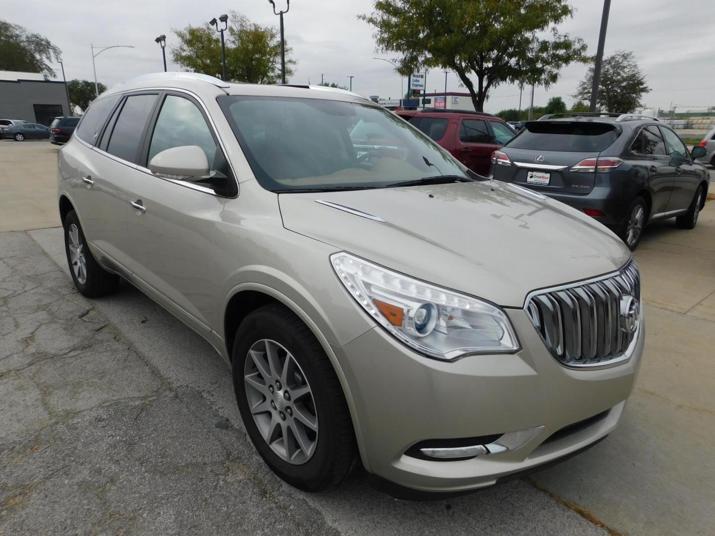 2014 TAN Buick Enclave Leather FWD (5GAKRBKDXEJ) with an 3.6L V6 DOHC 24V engine, 6-Speed Automatic Overdrive transmission, located at 2121 Burlington St, North Kansas City, MO, 64116, (816) 556-0707, 39.144707, -94.581978 - Photo#12