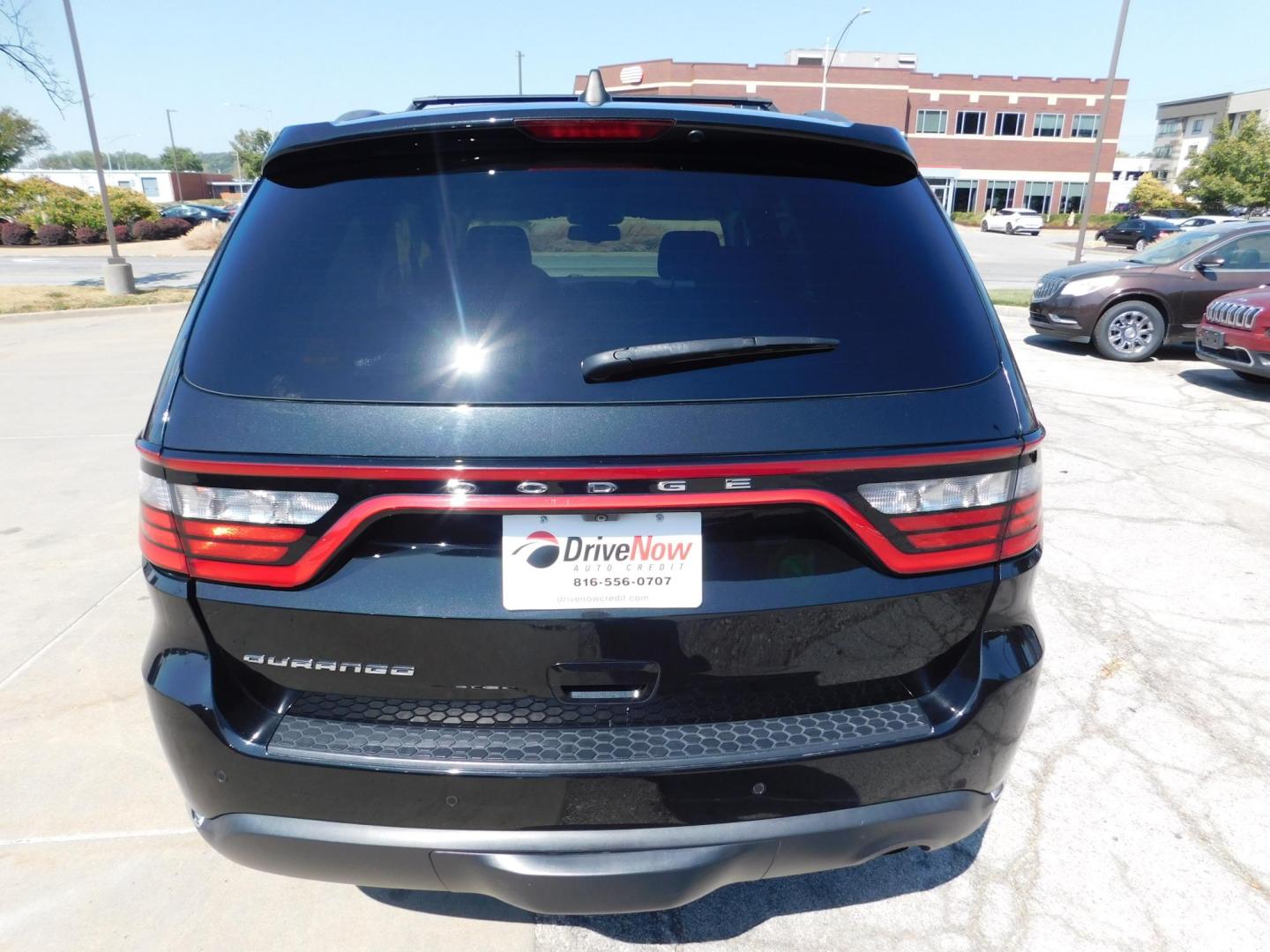 2014 BLACK Dodge Durango SXT RWD (1C4RDHAG4EC) with an 3.6L V6 DOHC 24V engine, 8-Speed Automatic transmission, located at 2121 Burlington St, North Kansas City, MO, 64116, (816) 556-0707, 39.144707, -94.581978 - Photo#9