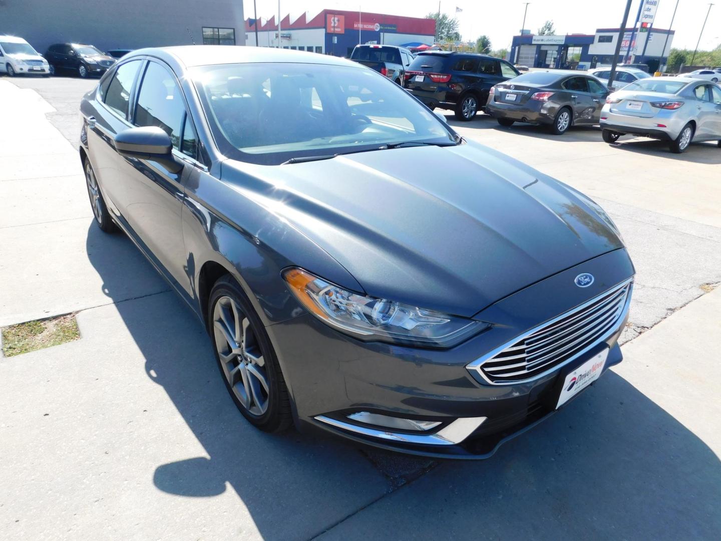 2017 GRAY Ford Fusion SE (3FA6P0HD4HR) with an 1.5L L4 DOHC 16V engine, 6A transmission, located at 2121 Burlington St, North Kansas City, MO, 64116, (816) 556-0707, 39.144707, -94.581978 - Photo#9