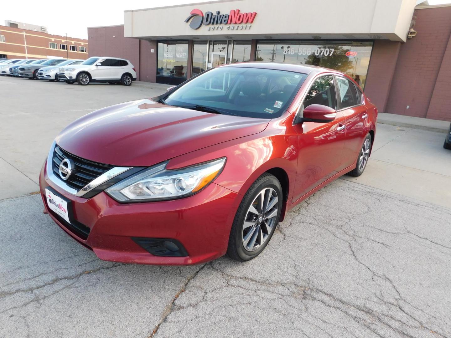 2016 RED Nissan Altima 2.5 SL (1N4AL3AP4GC) with an 2.5L L4 DOHC 16V engine, CVT transmission, located at 2121 Burlington St, North Kansas City, MO, 64116, (816) 556-0707, 39.144707, -94.581978 - Photo#0