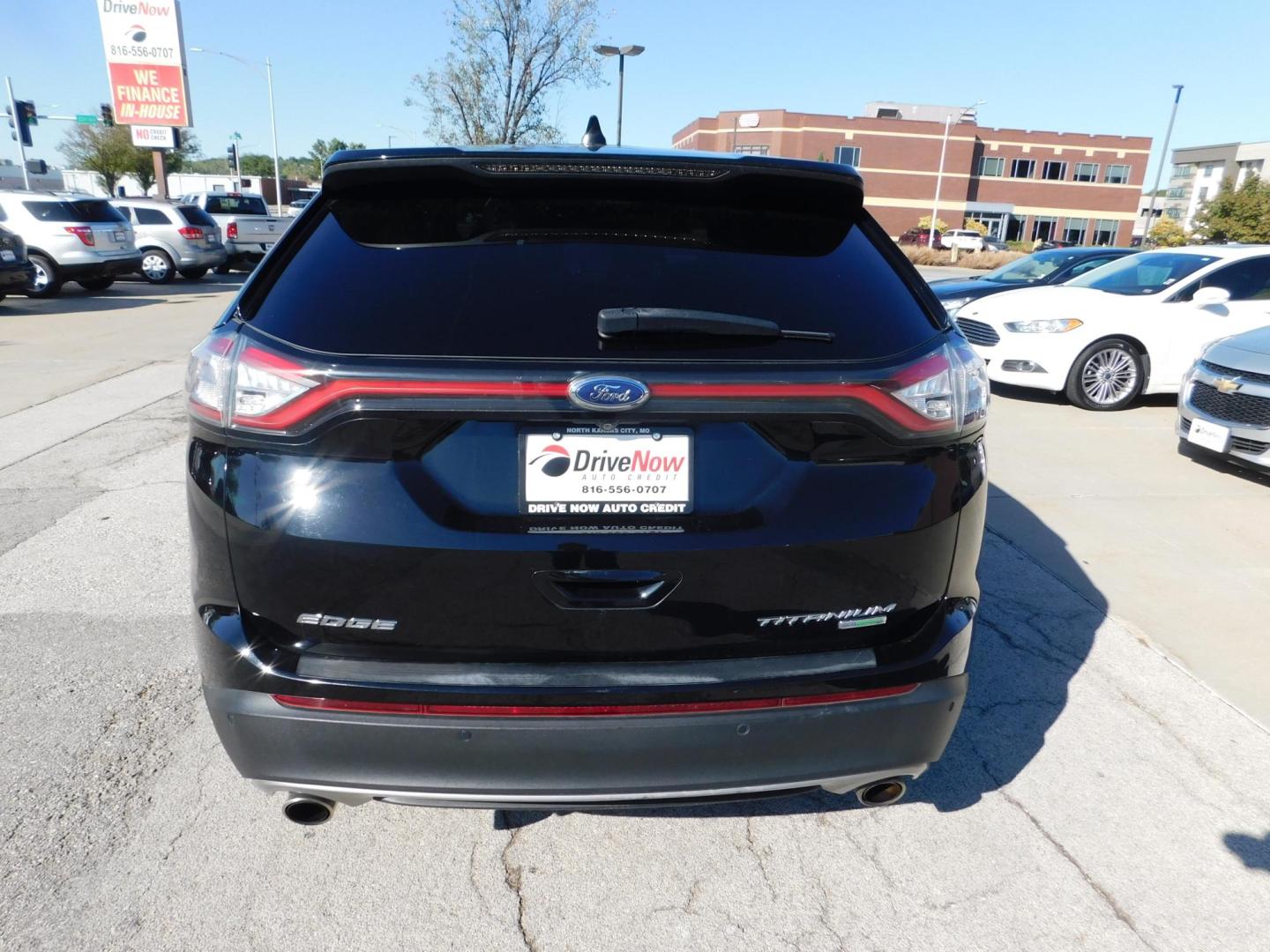 2018 BLACK Ford Edge Titanium (2FMPK3K93JB) with an 2.0L L4 DOHC 16V engine, 6A transmission, located at 2121 Burlington St, North Kansas City, MO, 64116, (816) 556-0707, 39.144707, -94.581978 - Photo#11