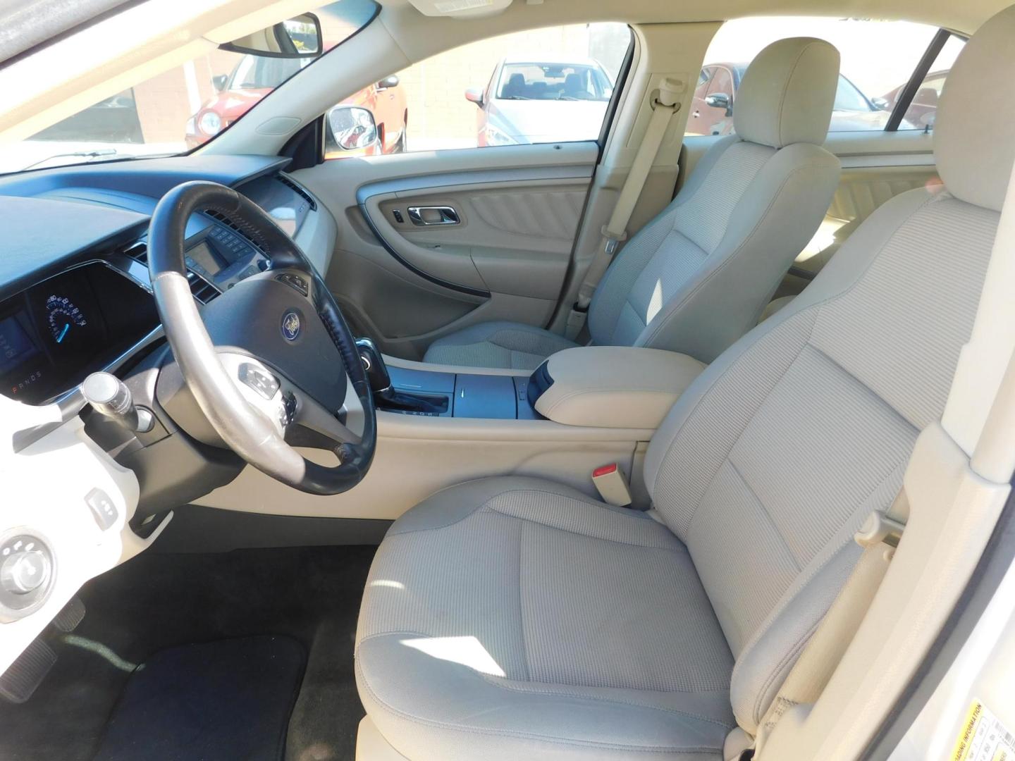 2016 SILVER Ford Taurus SEL FWD (1FAHP2E89GG) with an 3.5L V6 DOHC 24V engine, 6A transmission, located at 2121 Burlington St, North Kansas City, MO, 64116, (816) 556-0707, 39.144707, -94.581978 - Photo#2