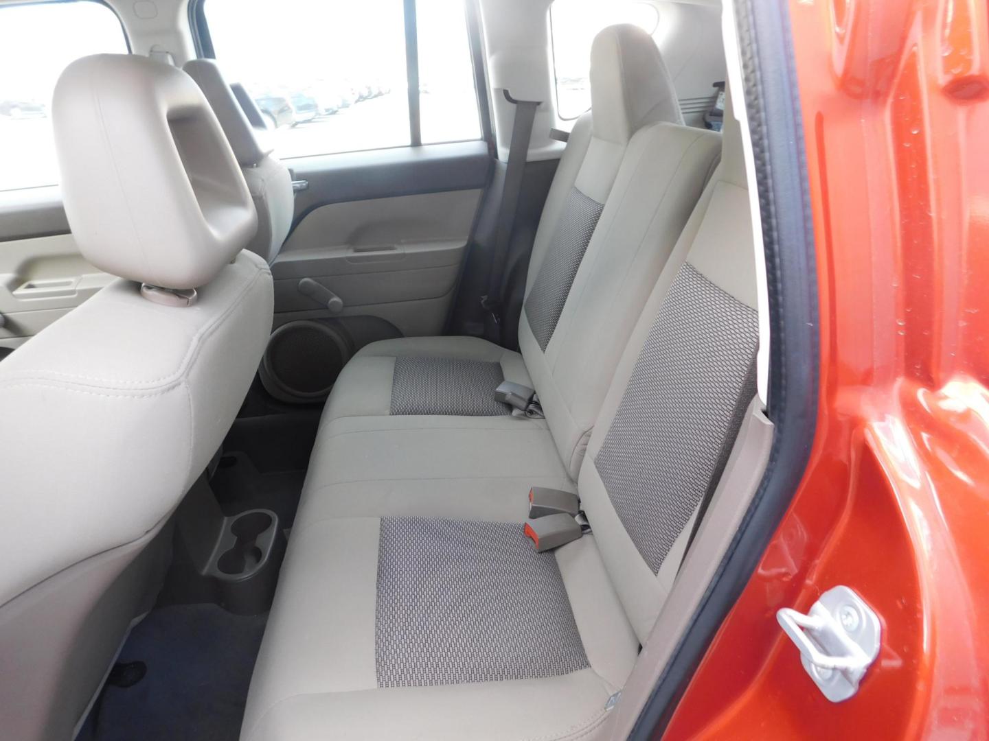 2008 ORANGE Jeep Compass Sport 2WD (1J8FT47WX8D) with an 2.4L L4 DOHC 16V engine, located at 2121 Burlington St, North Kansas City, MO, 64116, (816) 556-0707, 39.144707, -94.581978 - Photo#5