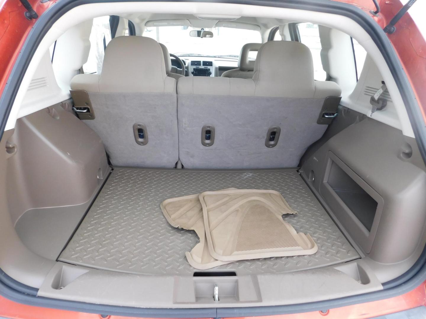 2008 ORANGE Jeep Compass Sport 2WD (1J8FT47WX8D) with an 2.4L L4 DOHC 16V engine, located at 2121 Burlington St, North Kansas City, MO, 64116, (816) 556-0707, 39.144707, -94.581978 - Photo#6