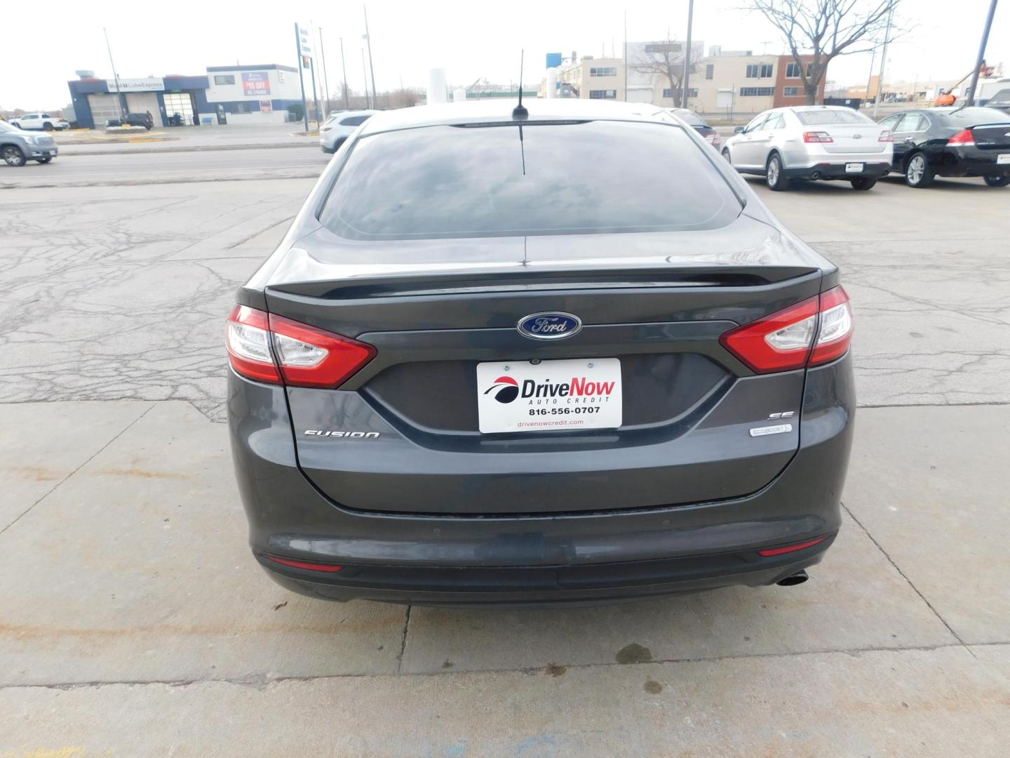 2015 GRAY Ford Fusion SE (1FA6P0HDXF5) with an 1.5L L4 DOHC 16V engine, located at 2121 Burlington St, North Kansas City, MO, 64116, (816) 556-0707, 39.144707, -94.581978 - Photo#7