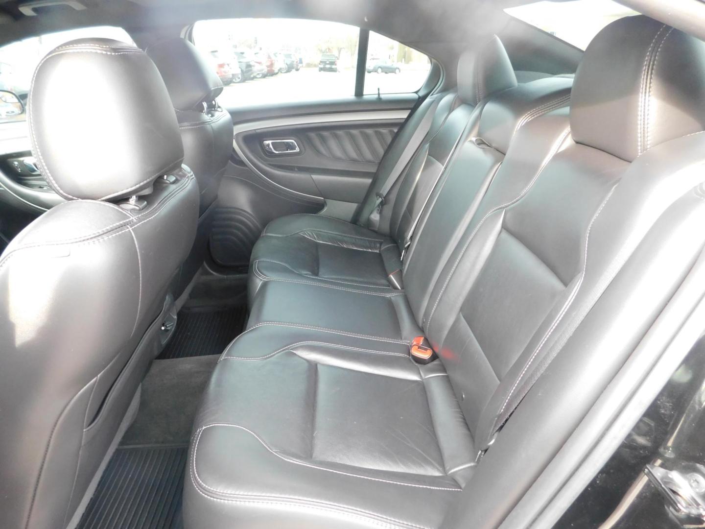 2013 BLACK Ford Taurus SEL FWD (1FAHP2E89DG) with an 3.5L V6 DOHC 24V engine, 6-Speed Automatic transmission, located at 2121 Burlington St, North Kansas City, MO, 64116, (816) 556-0707, 39.144707, -94.581978 - Photo#8