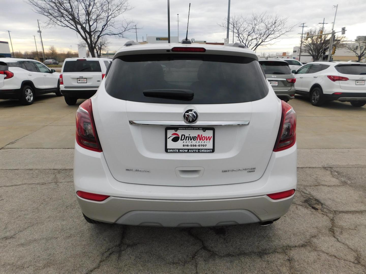 2017 WHITE Buick Encore Preferred AWD (KL4CJESBXHB) with an 1.4L L4 DOHC 16V TURBO engine, 6A transmission, located at 2121 Burlington St, North Kansas City, MO, 64116, (816) 556-0707, 39.144707, -94.581978 - Photo#7
