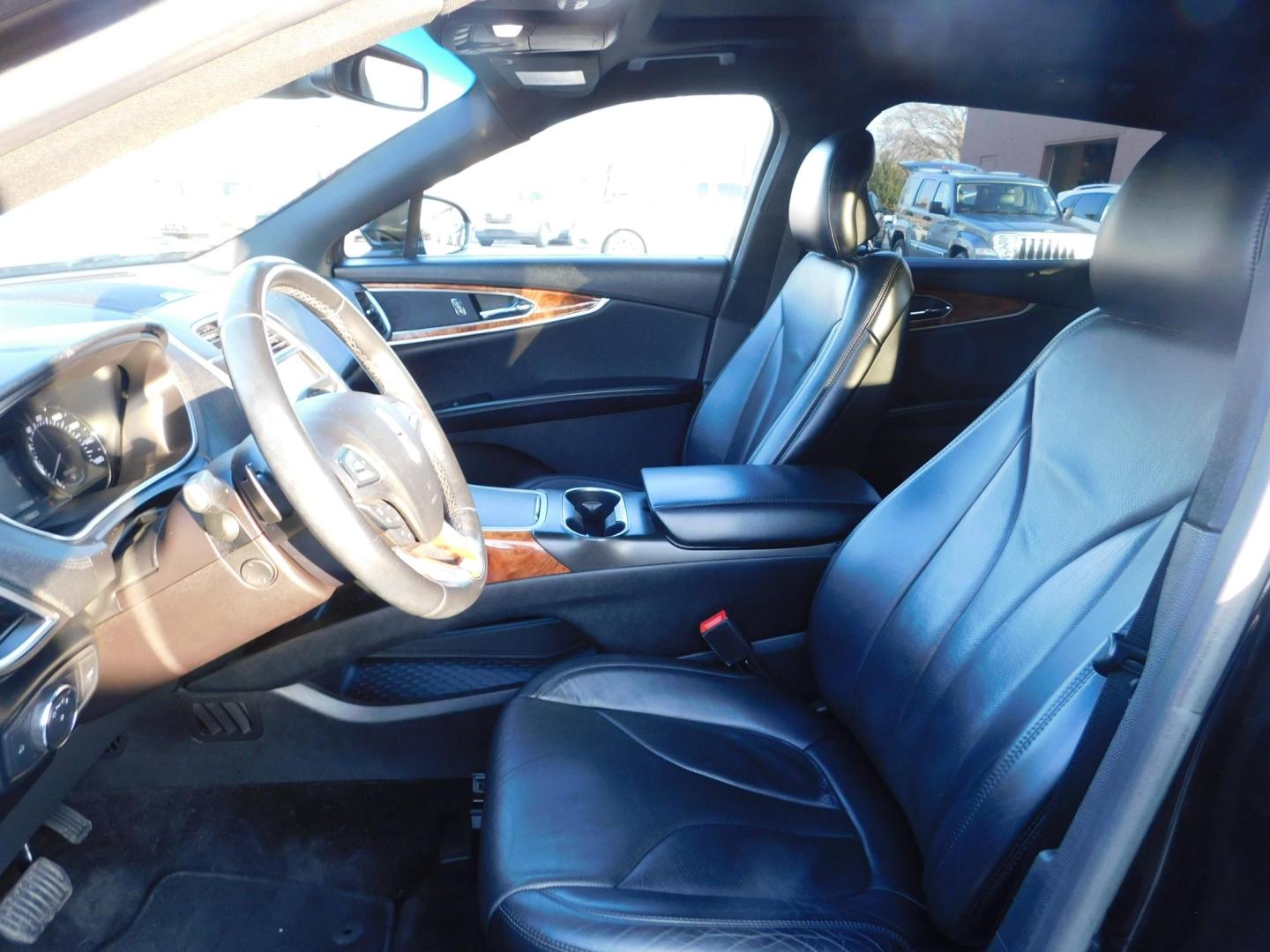 2016 BLACK Lincoln MKX Reserve AWD (2LMTJ8LR5GB) with an 3.7L V6 DOHC 24V engine, 6-Speed Automatic transmission, located at 2121 Burlington St, North Kansas City, MO, 64116, (816) 556-0707, 39.144707, -94.581978 - Photo#2