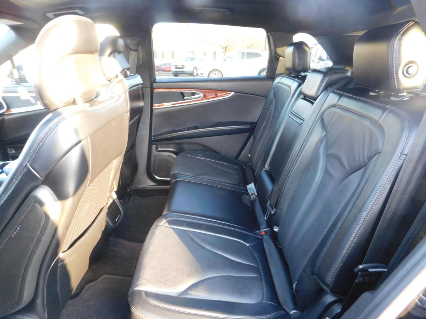 2016 BLACK Lincoln MKX Reserve AWD (2LMTJ8LR5GB) with an 3.7L V6 DOHC 24V engine, 6-Speed Automatic transmission, located at 2121 Burlington St, North Kansas City, MO, 64116, (816) 556-0707, 39.144707, -94.581978 - Photo#8