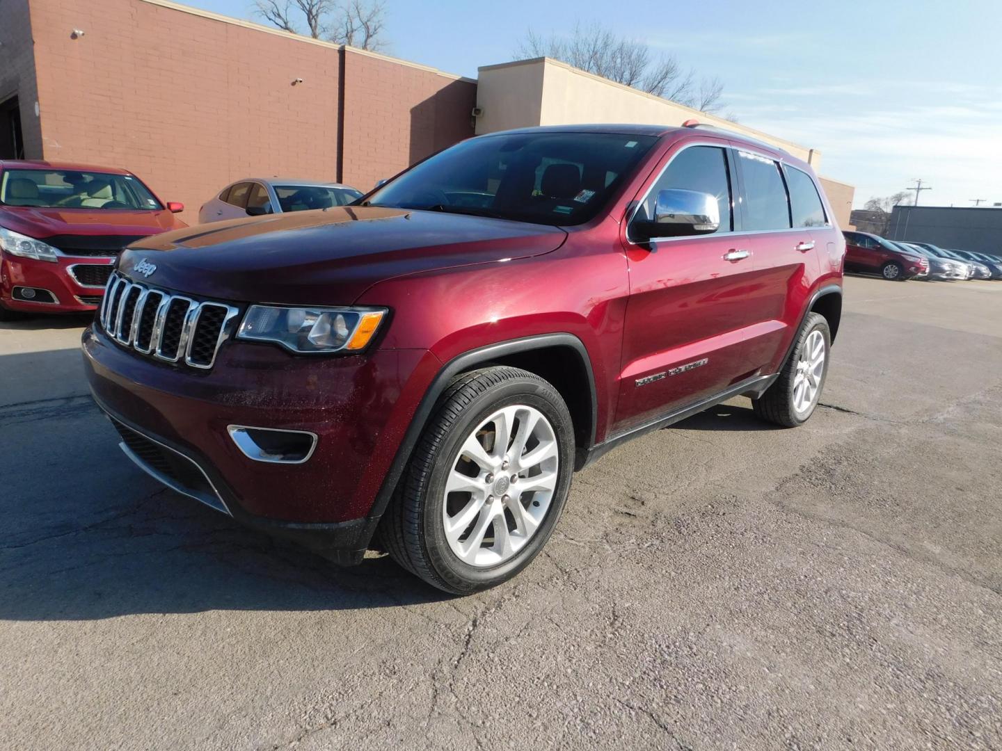 2017 RED Jeep Grand Cherokee Limited 4WD (1C4RJFBG4HC) with an 3.6L V6 DOHC 24V engine, 8A transmission, located at 2121 Burlington St, North Kansas City, MO, 64116, (816) 556-0707, 39.144707, -94.581978 - Photo#0