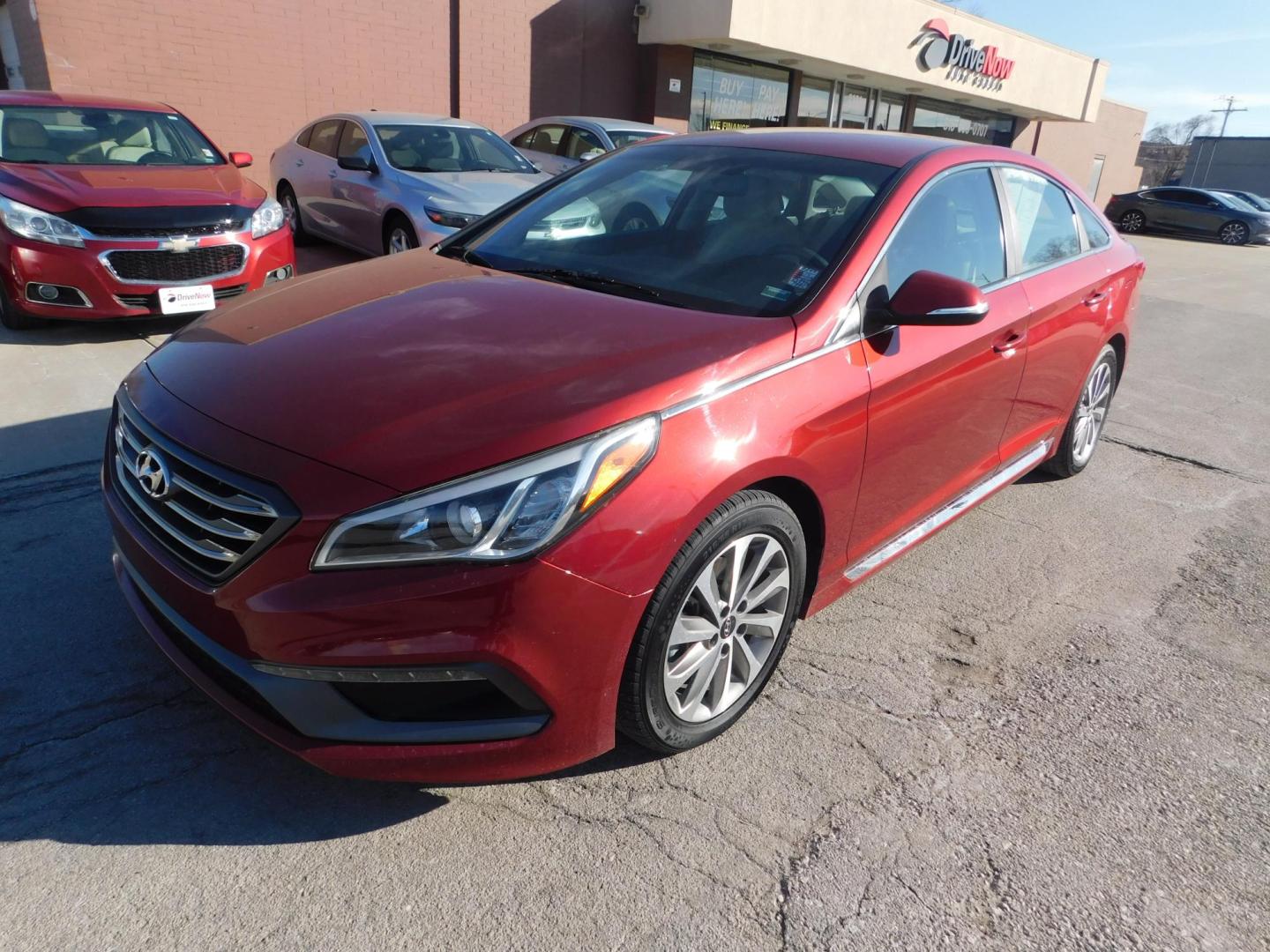 2015 RED Hyundai Sonata Sport (5NPE34AF1FH) with an 2.4L L4 DOHC 16V engine, 6-Speed Automatic transmission, located at 2121 Burlington St, North Kansas City, MO, 64116, (816) 556-0707, 39.144707, -94.581978 - Photo#0