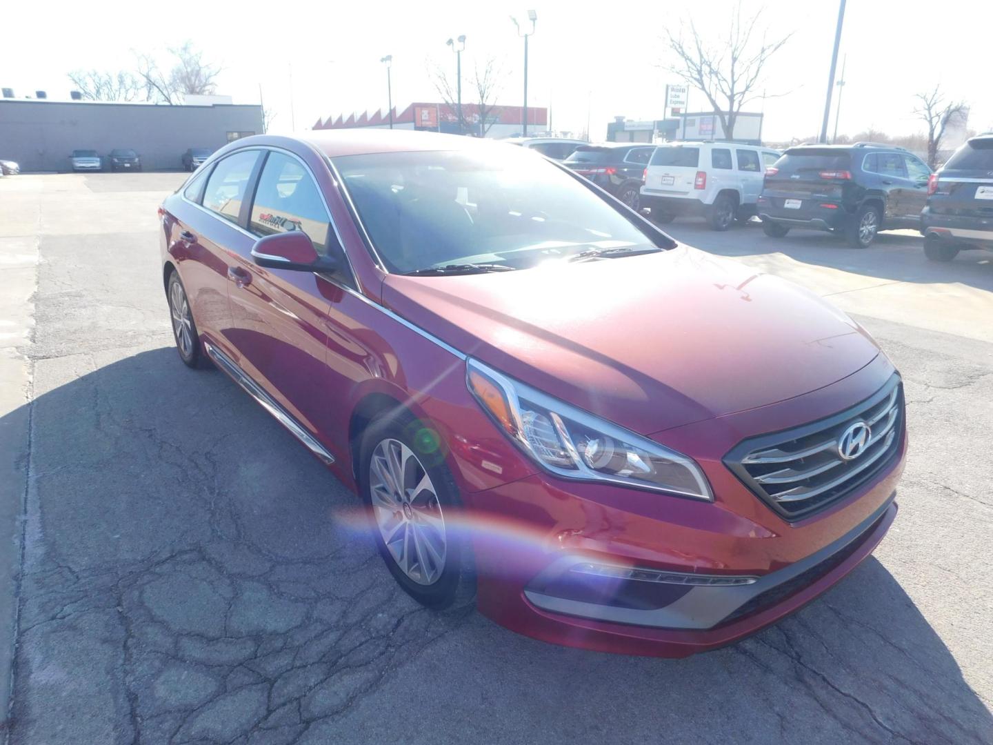 2015 RED Hyundai Sonata Sport (5NPE34AF1FH) with an 2.4L L4 DOHC 16V engine, 6-Speed Automatic transmission, located at 2121 Burlington St, North Kansas City, MO, 64116, (816) 556-0707, 39.144707, -94.581978 - Photo#9