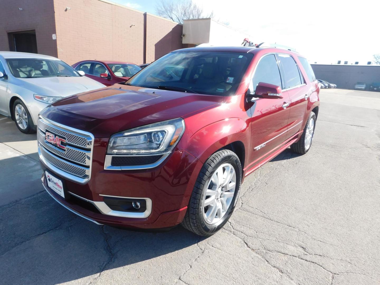2015 RED GMC Acadia Denali FWD (1GKKRTKD1FJ) with an 3.6L V6 DOHC 24V engine, 6-Speed Automatic transmission, located at 2121 Burlington St, North Kansas City, MO, 64116, (816) 556-0707, 39.144707, -94.581978 - Photo#0
