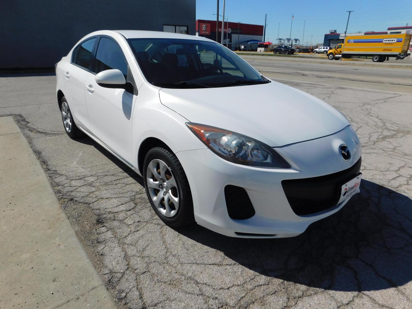 2013 WHITE Mazda MAZDA3 i SV MT 4-Door (JM1BL1TF9D1) with an 2.0L L4 DOHC 16V engine, 5-Speed Manual transmission, located at 2121 Burlington St, North Kansas City, MO, 64116, (816) 556-0707, 39.144707, -94.581978 - Photo#9