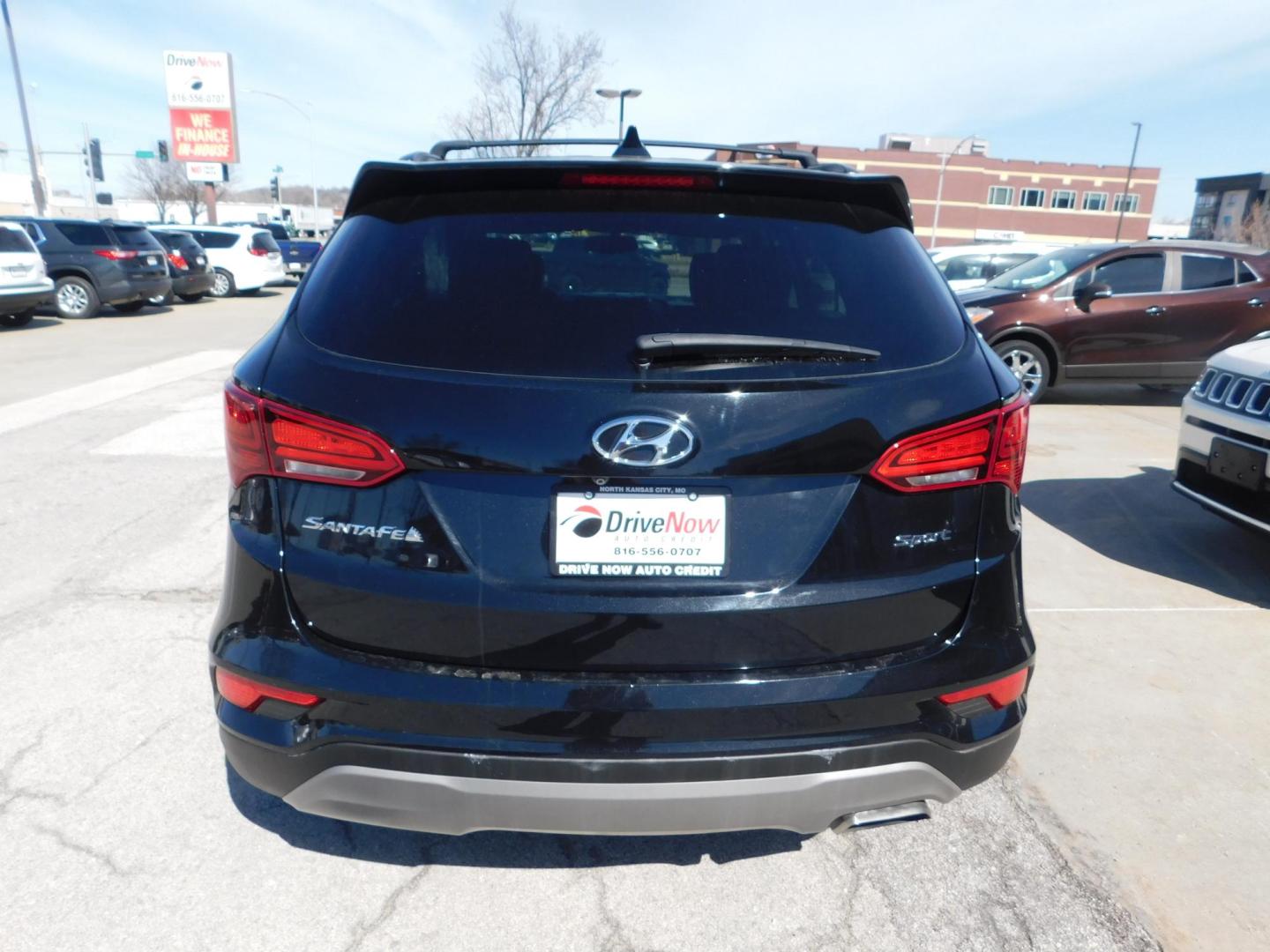 2017 BLACK Hyundai Santa Fe Sport 2.4 FWD (5NMZU3LB2HH) with an 2.4L L4 DOHC 16V engine, 6A transmission, located at 2121 Burlington St, North Kansas City, MO, 64116, (816) 556-0707, 39.144707, -94.581978 - Photo#8