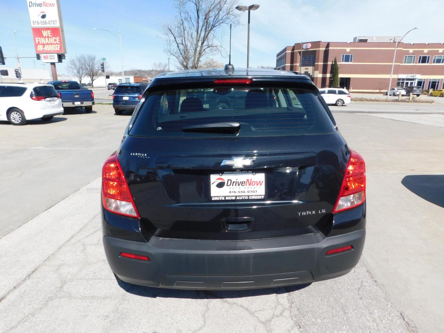 2015 BLACK Chevrolet Trax LS FWD (3GNCJKSB4FL) with an 1.4L L4 DOHC 16V FFV engine, located at 2121 Burlington St, North Kansas City, MO, 64116, (816) 556-0707, 39.144707, -94.581978 - Photo#8