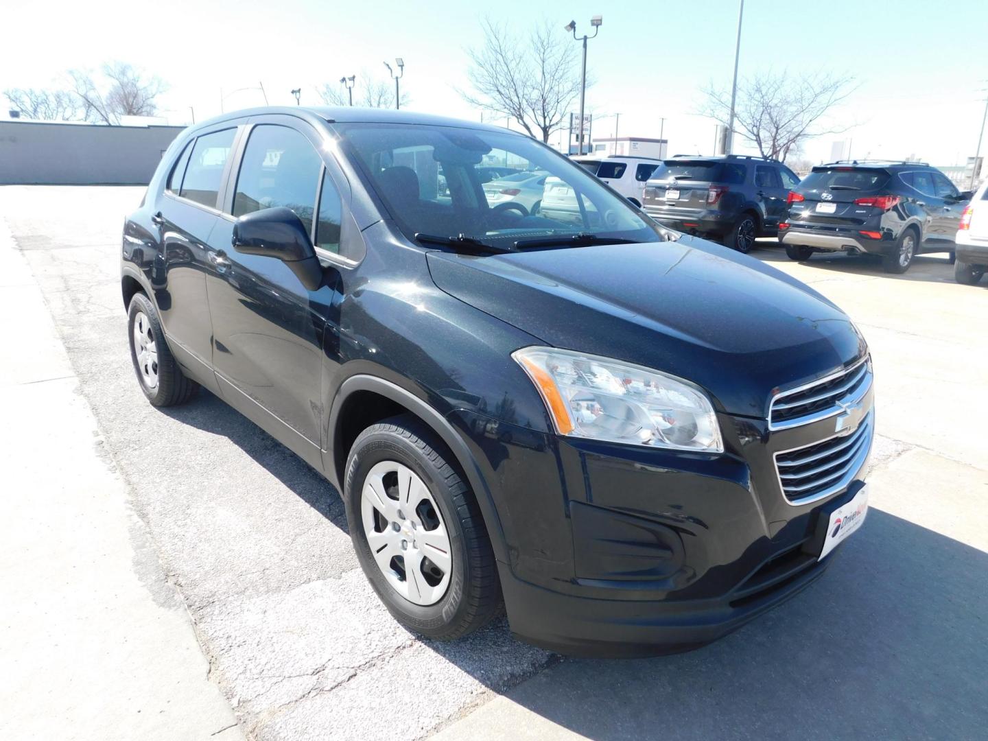 2015 BLACK Chevrolet Trax LS FWD (3GNCJKSB4FL) with an 1.4L L4 DOHC 16V FFV engine, located at 2121 Burlington St, North Kansas City, MO, 64116, (816) 556-0707, 39.144707, -94.581978 - Photo#9