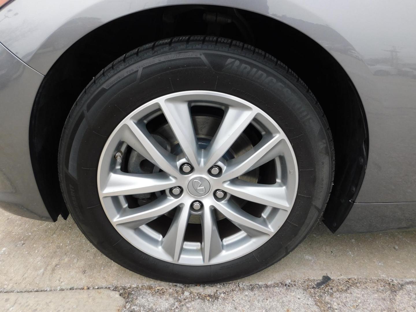 2015 SILVER Infiniti Q50 Base AWD (JN1BV7AR6FM) with an 3.7L V6 DOHC 24V HYBRID engine, 7-Speed Automatic transmission, located at 2121 Burlington St, North Kansas City, MO, 64116, (816) 556-0707, 39.144707, -94.581978 - Photo#1