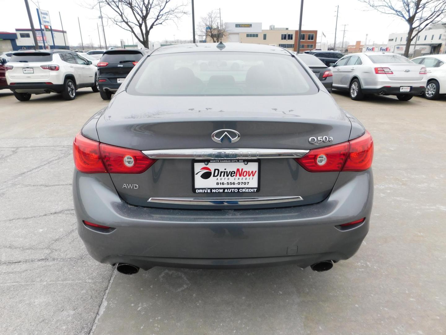 2015 SILVER Infiniti Q50 Base AWD (JN1BV7AR6FM) with an 3.7L V6 DOHC 24V HYBRID engine, 7-Speed Automatic transmission, located at 2121 Burlington St, North Kansas City, MO, 64116, (816) 556-0707, 39.144707, -94.581978 - Photo#9