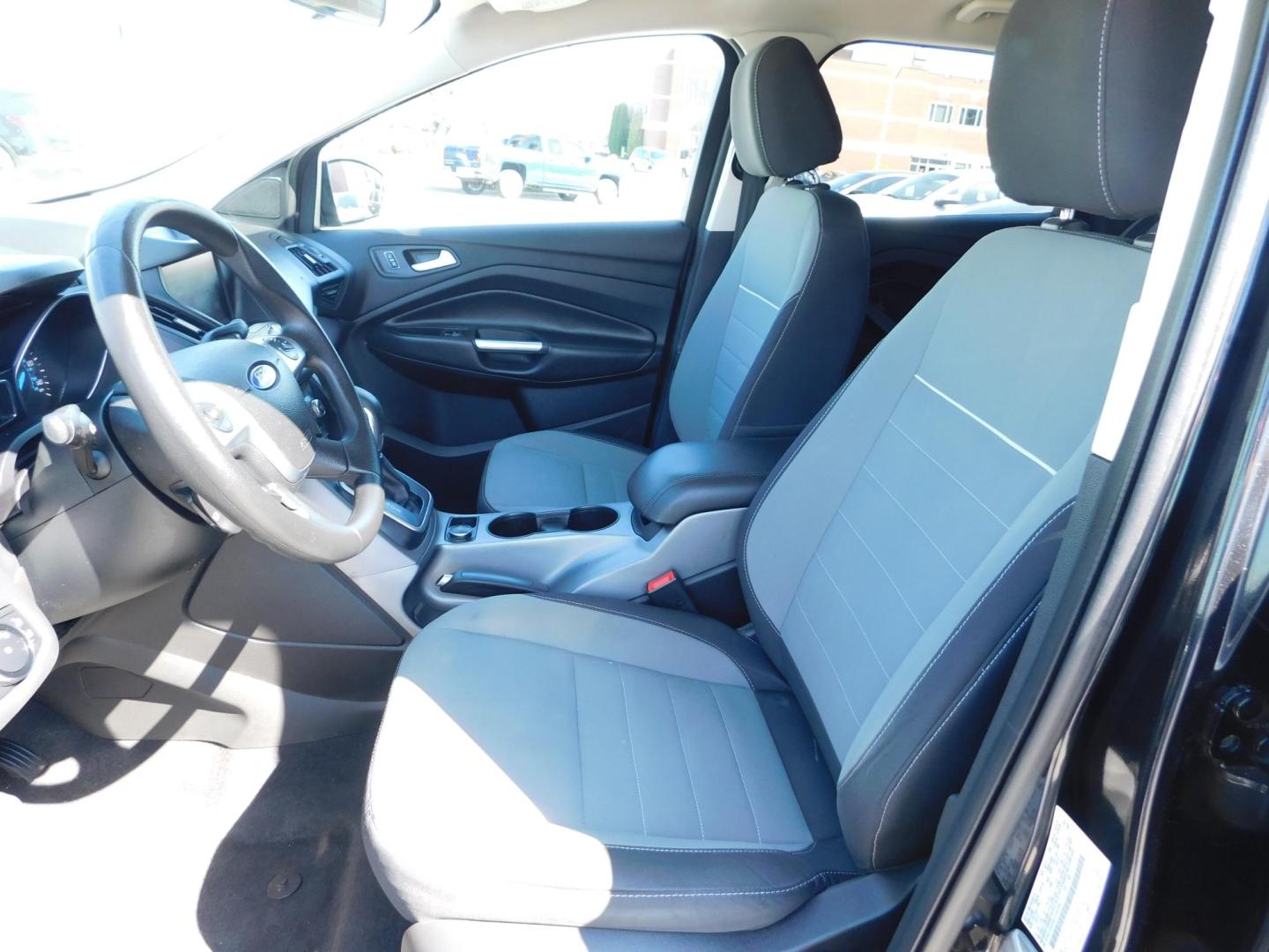 2014 BLACK Ford Escape SE FWD (1FMCU0GX4EU) with an 1.6L L4 DOHC 16V engine, 6-Speed Automatic transmission, located at 2121 Burlington St, North Kansas City, MO, 64116, (816) 556-0707, 39.144707, -94.581978 - Photo#2